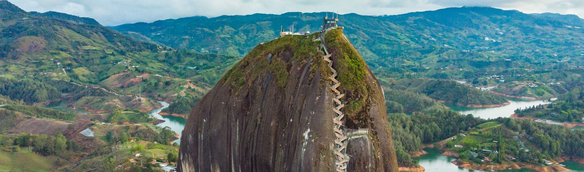 aerial_of_large_granite_rock_in_guatape_colombia_medellin.jpg